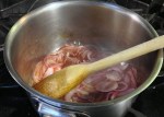 Me at the stove preparing the red onion pickle (sliced red onions sweated, deglazed with vinegar and sugar, reduced to syrup consistence, cool down to room temperature for later use.